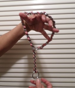 Note how the chain freely drops through the ring.